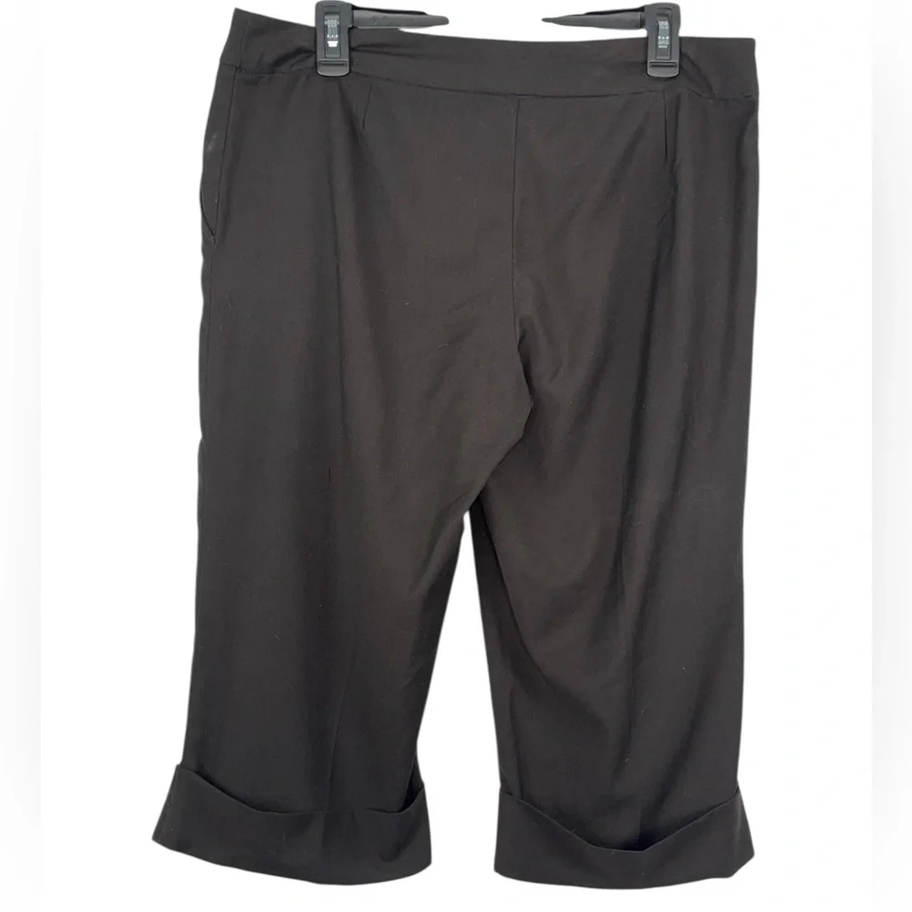 ECI Bermuda shorts with cuffed hem. Size 12 GUC
Color is brown. - Picture 4 of 9